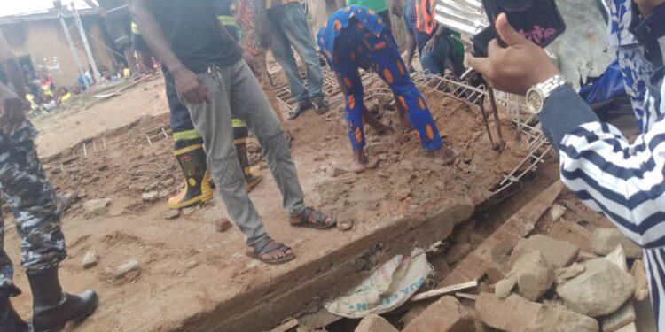 A two-storey building under construction, housing traders and shop owners, collapsed at the Eke Amawbia market in Awka